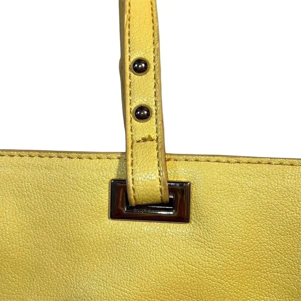 Nine West Ava Faux Leather Tote Bag Purse Floral Laser Cut Design Yellow Silver